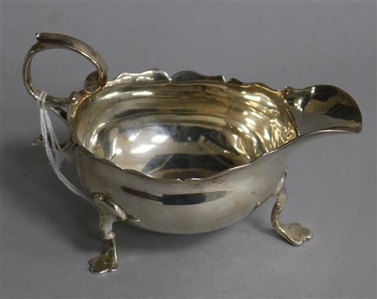 A George II silver sauceboat with flying scroll handle, circa 1755( marks rubbed),  3.5 oz.